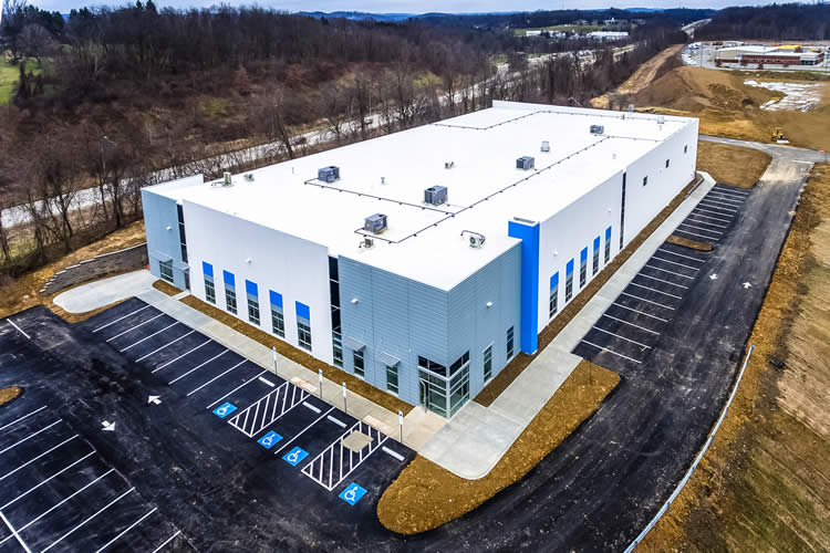 Hennecke GROUP’s new North American headquarters in Bridgeville, Penn., just before finishing touches were added in February. Hennecke GROUP’s new North American headquarters in Bridgeville, Penn., just before finishing touches were added in February.