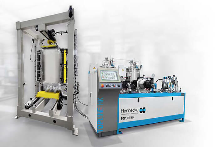 New mould carrier concept: a clamping device moves the foamed part completely out of the mould for easy removal. A TOPLINE high-pressure metering machine of size 650/650 assumes the metering task in the plant network. New mould carrier concept: a clamping device moves the foamed part completely out of the mould for easy removal. A TOPLINE high-pressure metering machine of size 650/650 assumes the metering task in the plant network.